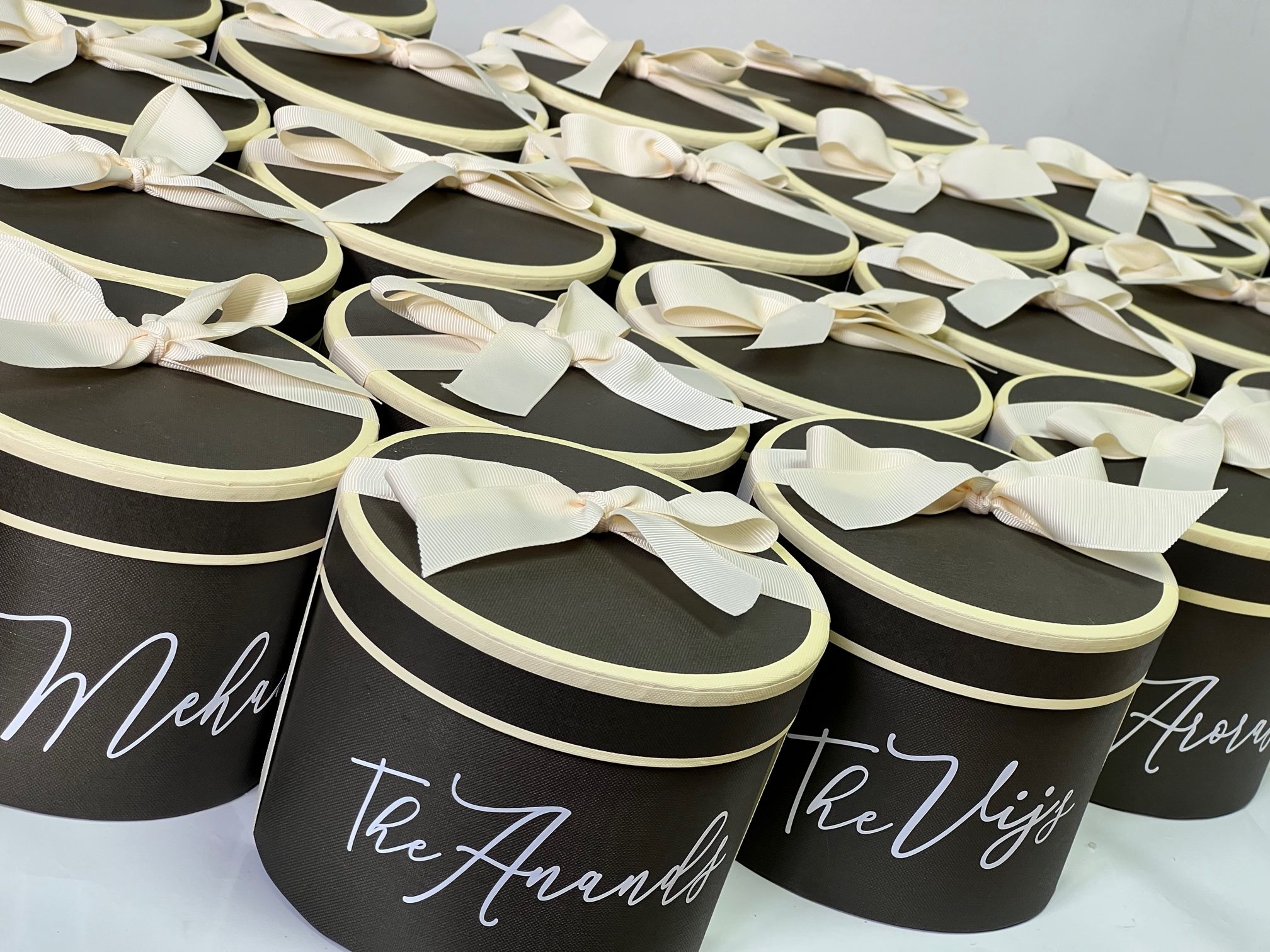 Personalised-round-gift-boxes-in-black-rotated
